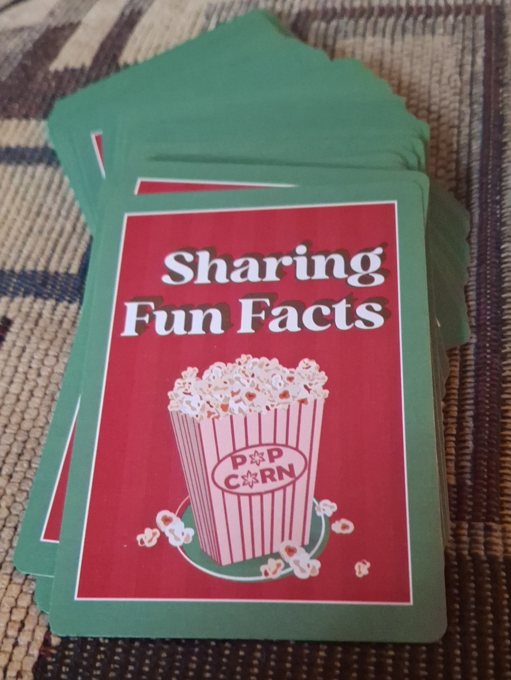 Sharing Fun Facts Party Card Game Popcorn Graphic
